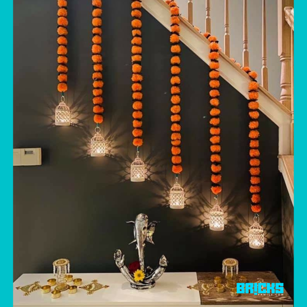 Diyas and flowers in Ganpati decoration for home