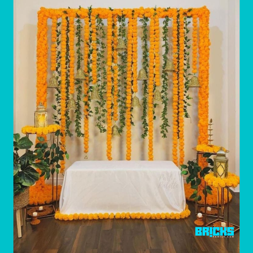 orange and green combination for ganapati flower decor