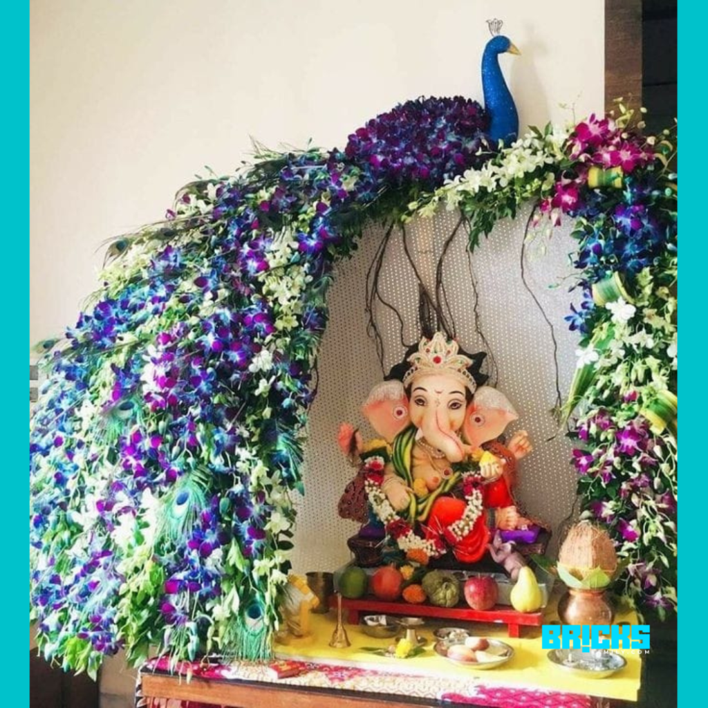 A beautiful Ganpati flower decoration, perfect for a small shrine at home