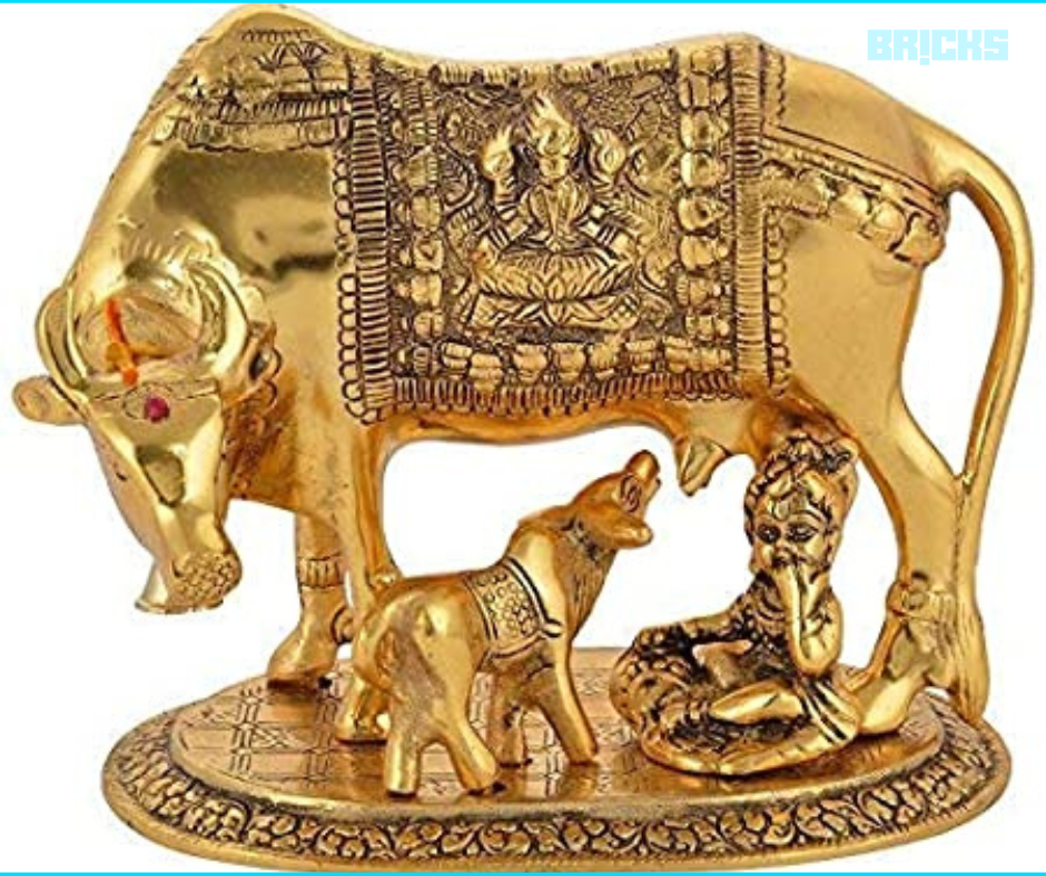 A beautiful, Vastu Kamdhenu cow and calf with Bal Krishna statue 