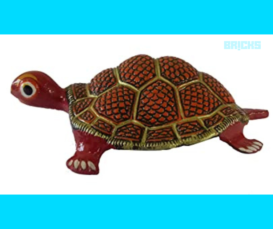 Wooden turtle painted in red