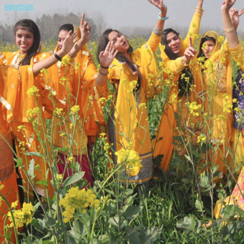 Women wearing yellow for Basant Panchami