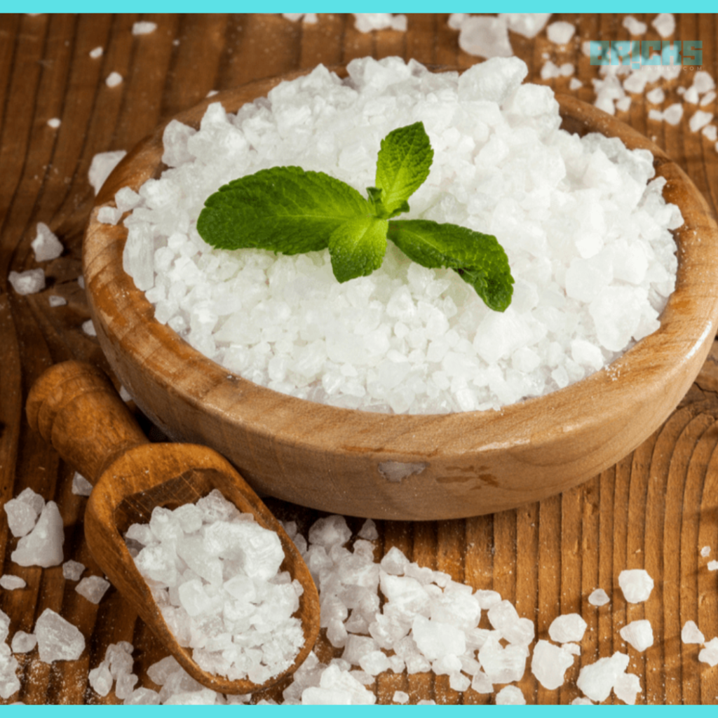 Wooden bowl filled with salt in bedroom