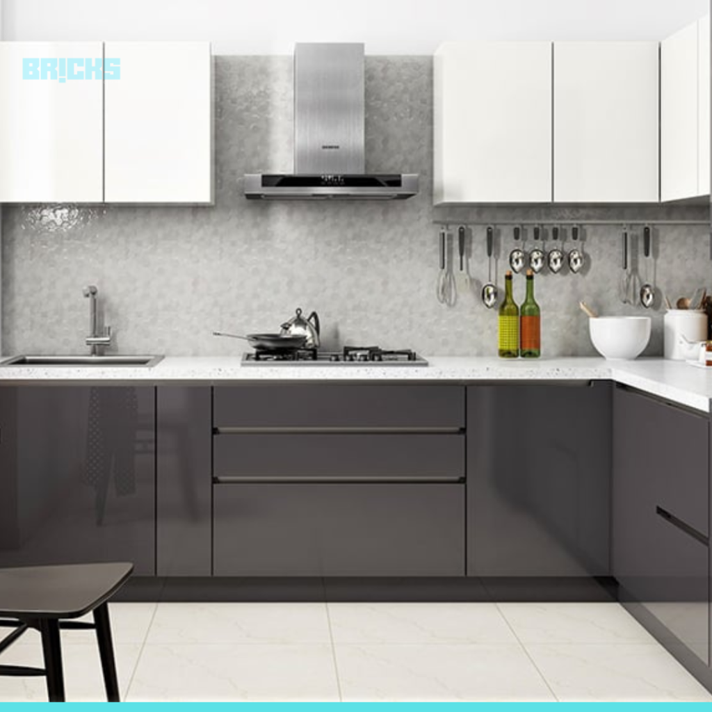 A clean kitchen with white walls and the stove facing the South East direction.