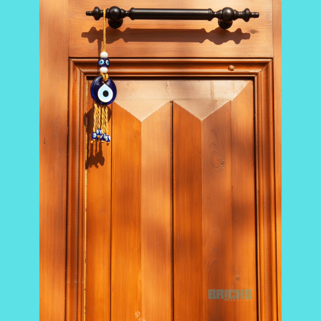 Hang evil eye protection at the entrance door to not let the negative energy enter