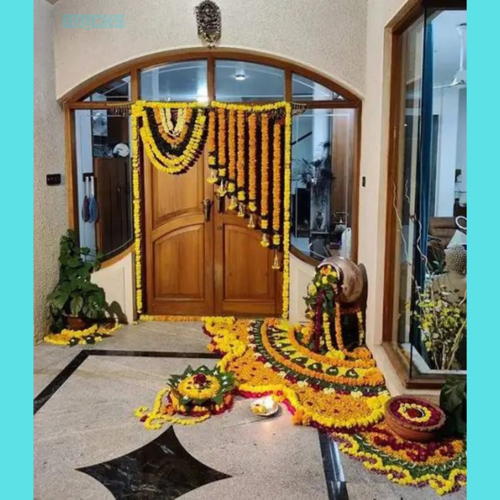 Hang layers of torans at the entrance door and augment their beauty with Onam Pookalam design at the entrance corner 