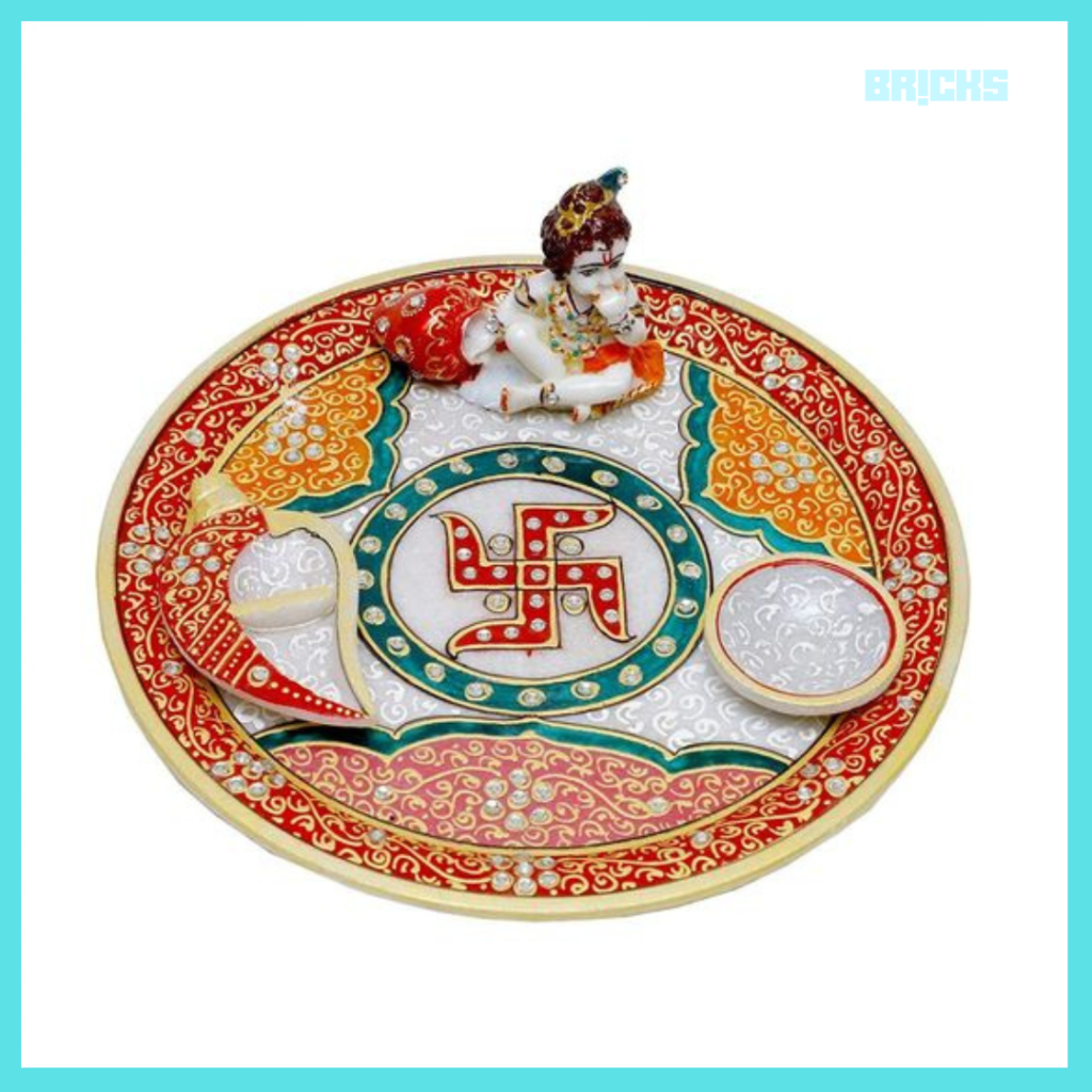 This multi-coloured marble pooja plate is just perfect for Krishna shringaar