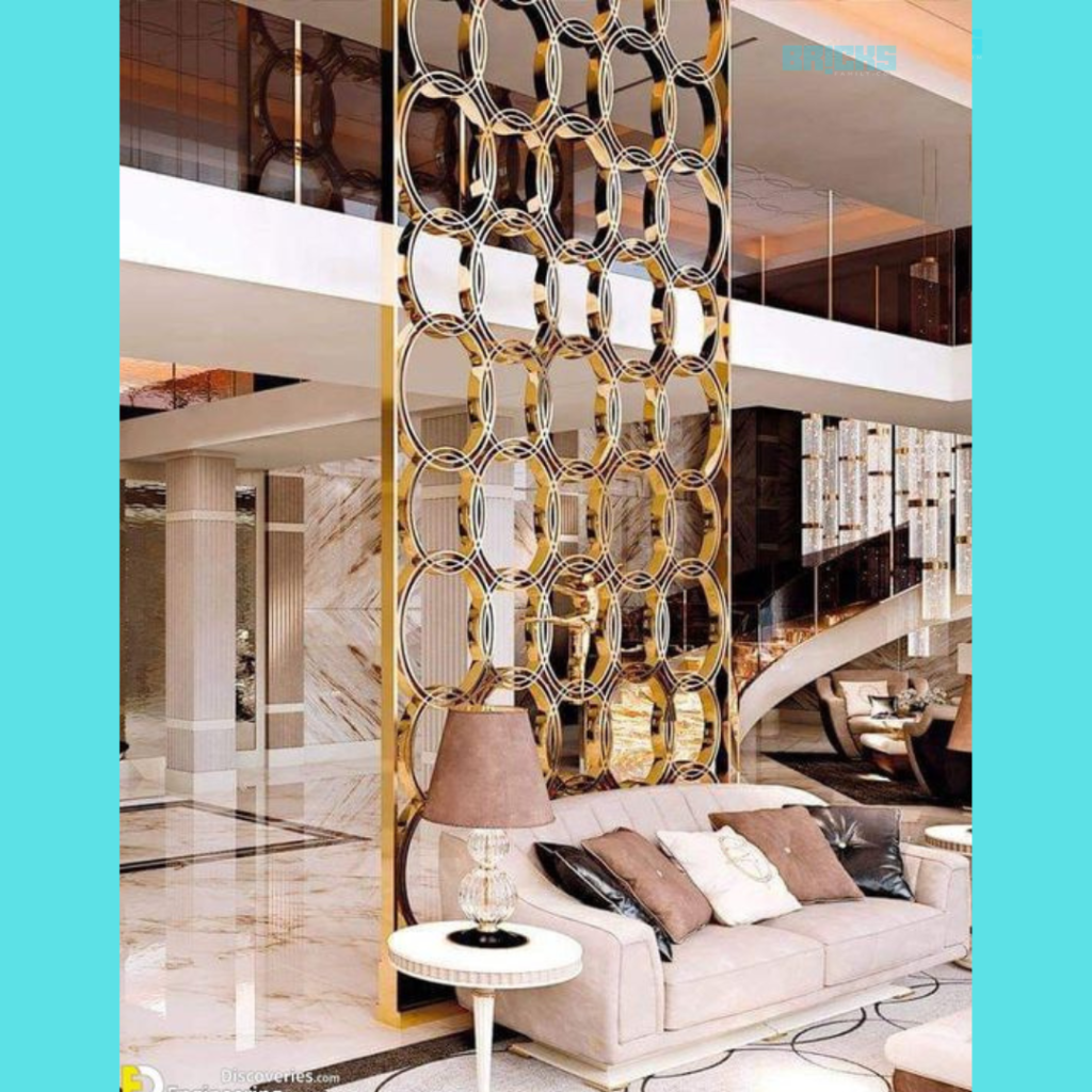 This metallic modern partition for living room features rings in a gold finish that add a modern twist to your home instantly 