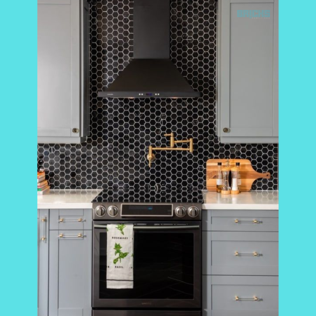 The metallic backsplash in this neutral kitchen design catches the eye in an instant 
